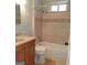 Bathroom with a tub and shower combination, plus a wooden vanity at 32 Highland Ne Dr, Atlanta, GA 30305