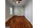 Spacious bedroom with hardwood floors, two closets, and neutral paint at 32 Highland Ne Dr, Atlanta, GA 30305