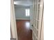 Bedroom doorway with view of hardwood floors and natural light at 32 Highland Ne Dr, Atlanta, GA 30305