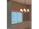 Dining room with a chandelier, wainscoting and window with blinds at 32 Highland Ne Dr, Atlanta, GA 30305