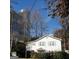Inviting two-story home showcasing a classic design and serene surroundings at 32 Highland Ne Dr, Atlanta, GA 30305