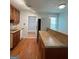 Traditional kitchen with hardwood floors, wood cabinets, and ample counter space at 32 Highland Ne Dr, Atlanta, GA 30305