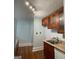Traditional kitchen features wood cabinets and stainless steel sink at 32 Highland Ne Dr, Atlanta, GA 30305