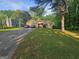 Charming single-Gathering home with attached garage and lush green lawn at 3244 Harbor Woods Rd, Decatur, GA 30034