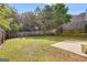 Spacious backyard with healthy grass and a concrete patio, perfect for outdoor entertaining at 507 Rippling Dr, Temple, GA 30179