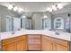 Bright bathroom with double sinks, updated vanity, and an arched window for natural light at 507 Rippling Dr, Temple, GA 30179