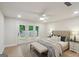 Cozy bedroom with a plush bed, neutral decor, and French doors leading to the backyard, creating a tranquil retreat at 1000 Arbor Forest Sw Way # 1000, Marietta, GA 30064