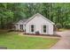Charming home with neutral siding, complemented by well-maintained landscaping at 1000 Arbor Forest Sw Way # 1000, Marietta, GA 30064