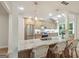 Open kitchen featuring a large island with bar seating, stainless steel appliances, and skylights for abundant natural light at 1000 Arbor Forest Sw Way # 1000, Marietta, GA 30064
