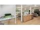 Open-concept kitchen featuring granite countertops, stainless steel appliances, and seamless flow to the dining and living spaces at 1000 Arbor Forest Sw Way # 1000, Marietta, GA 30064
