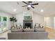 Bright living room features hardwood floors, fireplace, ceiling fan and abundant natural light at 1000 Arbor Forest Sw Way # 1000, Marietta, GA 30064