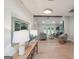 Bright living room features hardwood floors, fireplace, ceiling fan and abundant natural light at 1000 Arbor Forest Sw Way # 1000, Marietta, GA 30064