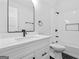 Clean bathroom showcasing a vanity, toilet, and shower/tub combination with white subway tile and modern fixtures at 378 Grant Park Se Pl, Atlanta, GA 30315