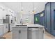 Beautiful open concept kitchen with stainless appliances and large island with bar seating at 378 Grant Park Se Pl, Atlanta, GA 30315