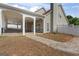 Backyard stone patio with large covered area perfect for entertaining Gathering and friends at 3941 Kings Pl, Ellenwood, GA 30294