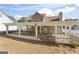 Stunning backyard featuring a covered patio, perfect for outdoor relaxation and dining at 3941 Kings Pl, Ellenwood, GA 30294