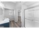 Updated bathroom features shower, new vanity, and modern fixtures at 3941 Kings Pl, Ellenwood, GA 30294