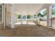 Inviting covered patio with stone flooring, perfect for outdoor entertaining and relaxing at 3941 Kings Pl, Ellenwood, GA 30294