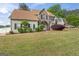 Charming two-story home with manicured lawn and landscaping at 3941 Kings Pl, Ellenwood, GA 30294