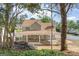 Large, covered patio with an outdoor fireplace, great for entertaining Gathering and friends at 3941 Kings Pl, Ellenwood, GA 30294