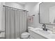 Bathroom with a shower curtain, toilet, vanity, and a mirror at 152 Creekrise Pl, Palmetto, GA 30268