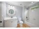 Bathroom features a white vanity, tile floors and shower with white tile at 2548 Kickerillo Se Way, Atlanta, GA 30316