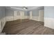 Large bedroom with hardwood floors, multiple closets, and natural light at 2548 Kickerillo Se Way, Atlanta, GA 30316