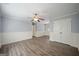 Bedroom with chair rail features hardwood floors, natural light, and ceiling fan at 2548 Kickerillo Se Way, Atlanta, GA 30316