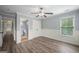 Bright bedroom with hardwood floors, ceiling fan, and natural light at 2548 Kickerillo Se Way, Atlanta, GA 30316