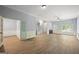 Open living room has hardwood floors, natural light and staircase access at 2548 Kickerillo Se Way, Atlanta, GA 30316