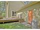 Exterior view of backyard with deck and sliding door to back of house at 401 Waterwood Bnd, Peachtree City, GA 30269