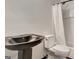 Bathroom featuring sleek black pedestal sink and tub and shower with curtain at 401 Waterwood Bnd, Peachtree City, GA 30269
