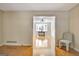 Dining room with natural light from the window and wood-look floors at 401 Waterwood Bnd, Peachtree City, GA 30269