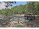 Several golf carts parked near the lake, providing easy access to waterfront amenities and scenic views at 401 Waterwood Bnd, Peachtree City, GA 30269