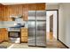 Beautiful kitchen with a stainless steel range and refrigerator at 401 Waterwood Bnd, Peachtree City, GA 30269