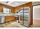 Modern kitchen with stainless steel appliances and plentiful cabinet space at 401 Waterwood Bnd, Peachtree City, GA 30269