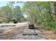 View of a golf cart path near a home in a leafy community, offering a scenic and convenient lifestyle at 401 Waterwood Bnd, Peachtree City, GA 30269