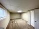 Spacious basement with a door and large window providing ample natural light at 4397 Bluebird Ln, Lithia Springs, GA 30122
