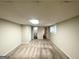 Spacious basement area that connects to a bathroom at 4397 Bluebird Ln, Lithia Springs, GA 30122