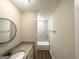 Stylish bathroom featuring granite countertop vanity and updated fixtures at 4397 Bluebird Ln, Lithia Springs, GA 30122