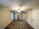 Bedroom with neutral walls, carpet, a ceiling fan, and an ensuite bathroom at 4397 Bluebird Ln, Lithia Springs, GA 30122