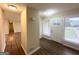 Inviting entryway with wood-look flooring, bright natural light and a view into the spacious living area at 4397 Bluebird Ln, Lithia Springs, GA 30122