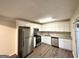 Updated kitchen with stainless steel appliances, ample white cabinets and granite countertops is move-in ready at 4397 Bluebird Ln, Lithia Springs, GA 30122