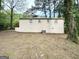 This home has a neutral paint color, an air conditioner and a deck at 3332 Ruby H Harper Se Blvd, Atlanta, GA 30354