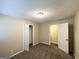 Comfortable bedroom with neutral walls, carpet, and a closet at 3332 Ruby H Harper Se Blvd, Atlanta, GA 30354