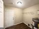 Functional laundry room with a door to the outside and essential hookups at 3332 Ruby H Harper Se Blvd, Atlanta, GA 30354