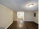 Spacious living room featuring wood flooring and neutral paint at 3332 Ruby H Harper Se Blvd, Atlanta, GA 30354