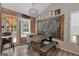 Charming dining area featuring a picnic table, chalkboard, and decorative accents at 127 Muirwood Dr, Temple, GA 30179