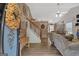 Warm and inviting living room with hardwood floors and ample natural light at 127 Muirwood Dr, Temple, GA 30179