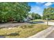 Expansive yard featuring a large shed, basketball hoop, and ample space for recreation at 127 Muirwood Dr, Temple, GA 30179
